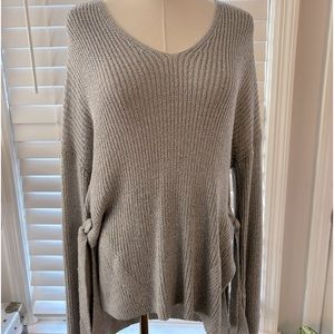 Lush Brand Silver/Gray sweater with grommet detail on sides